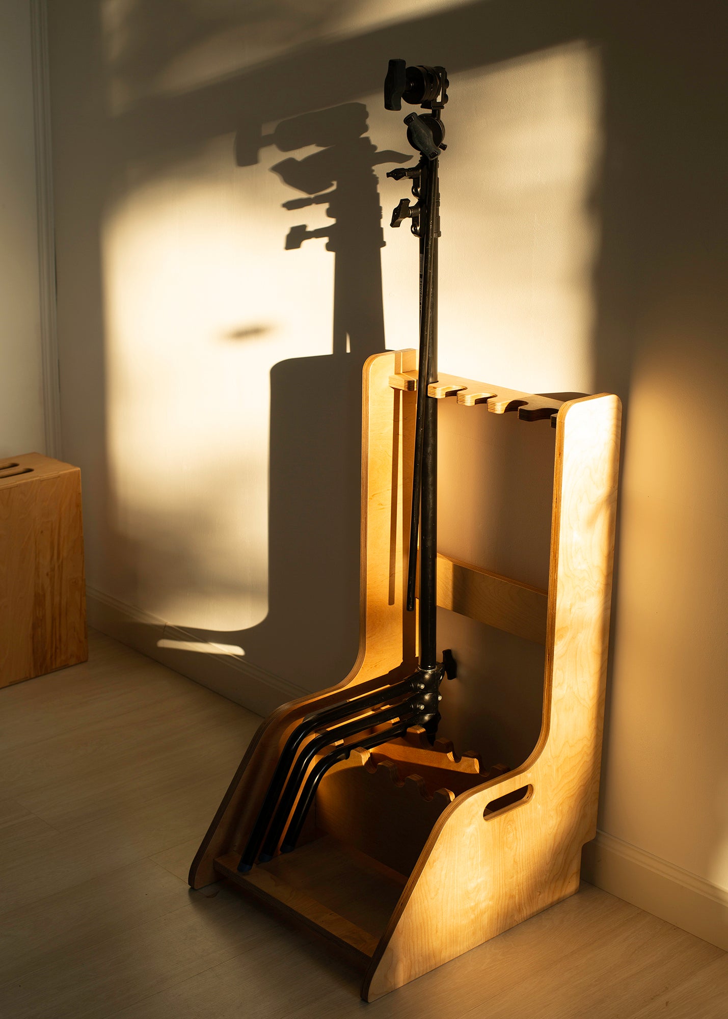 Plywood storage rack for C-Stands for photo studio